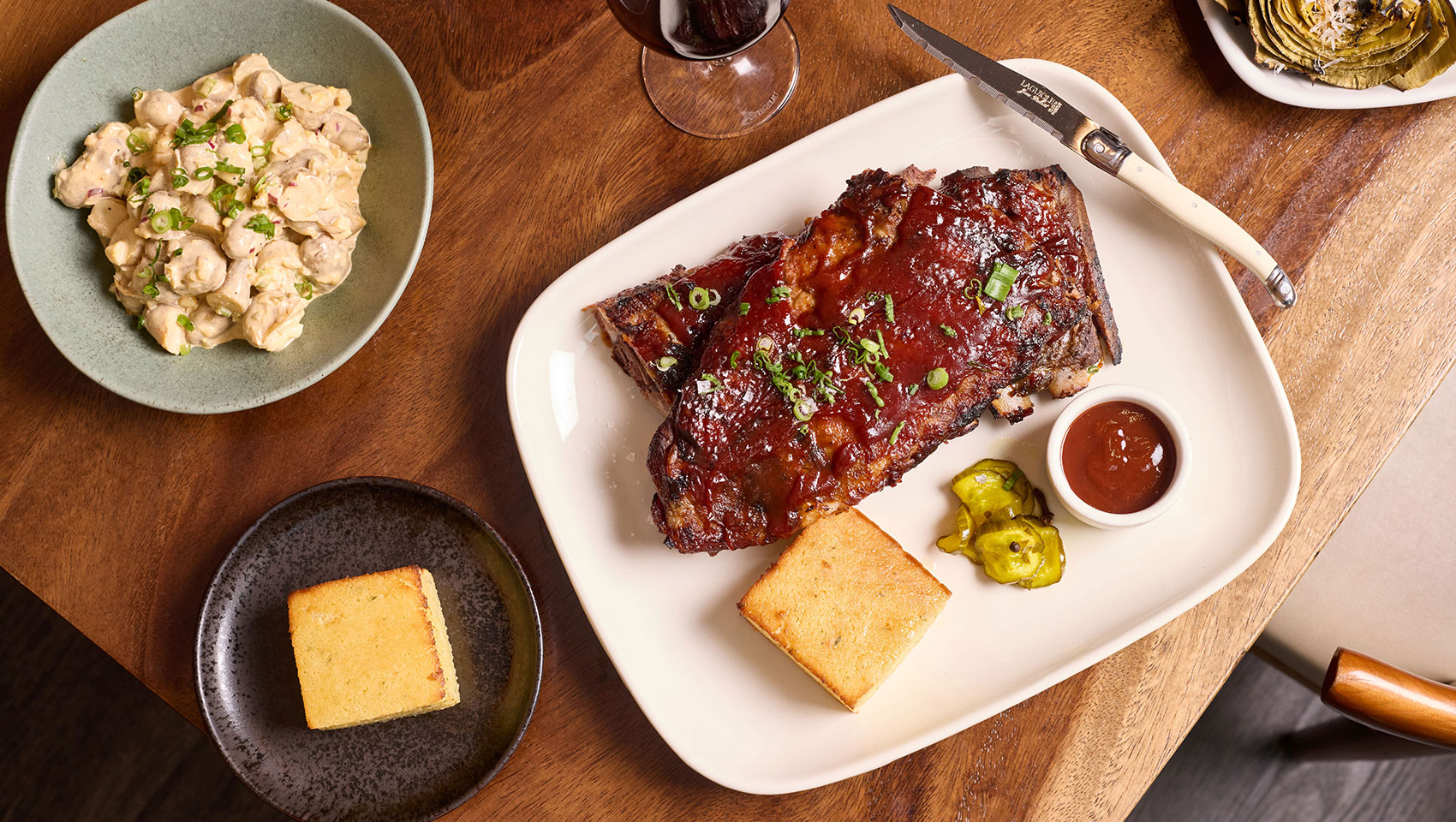 aerial image of ribs on a table spread