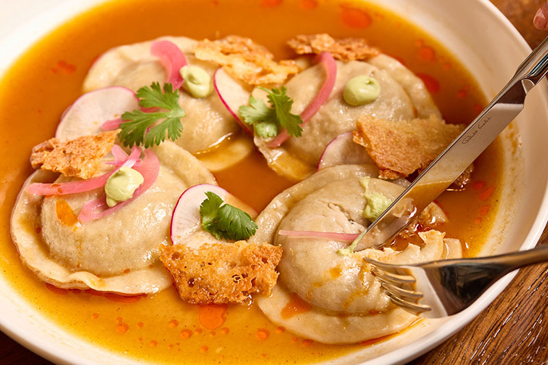 close up image of duck raviolo